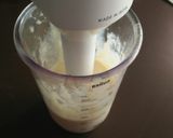 A picture of step 2 of A couple of smoothies#magic with blue curacao syrup.