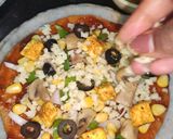 A picture of step 9 of Veggie Loaded Pizza and Mushroom And Paneer Pizza Thin Crust.