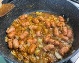 A picture of step 9 of Mini Pork Sausages with Red Pesto, Garlic, Onion, and Oregano.