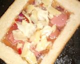 A picture of step 8 of Cheesy sausage sandwich.