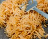 A picture of step 2 of Gajar Halwa.