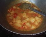 A picture of step 27 of Gujrati masala puri with aloo sabji.