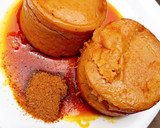 A picture of step 5 of Moimoi with sauce.