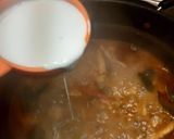 A picture of step 4 of Thai Chicken Tom yum soup.