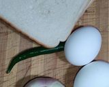 A picture of step 1 of Bread Omelette 😋🍽️.