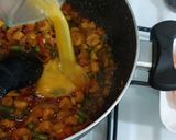 A picture of step 4 of Tom yum shrimp rice.
