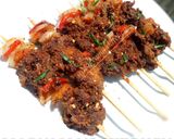 A picture of step 7 of Tsire Skewers.