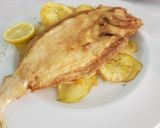 A picture of step 5 of Fried European Sole on a Bed of Potatoes and Garlic with Onion Rings.