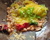 A picture of step 2 of Green raw mango rice.
