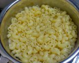 A picture of step 1 of White Sauce Cheesy Pasta.