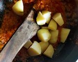 A picture of step 2 of Aloo Matar (Potato-Peas Curry).