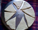 A picture of step 2 of Mandazi with cardamom powder.
