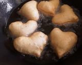 A picture of step 4 of Heart shaped mandazi.