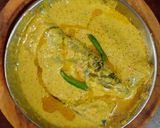 A picture of step 4 of Pabda Paturi (with Taro/ kochu/Alvi leaves) and Pabda Bhappa.