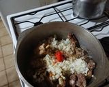 Foto del paso 4 de la receta: Arroz amarillo con menudos y alitas