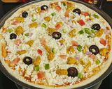 A picture of step 2 of Chicken Tikka Pizza 🍕🍕.