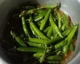 A picture of step 3 of Spicy Matar Ki Phalyan.