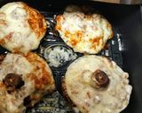 A picture of step 7 of Air Fryer Sausage Stuffed Portobello Mushrooms with Provolone.