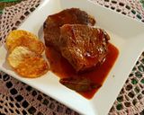 Foto del paso 5 de la receta: Bifes de peceto en salsa roja al vino blanco