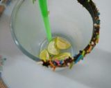 A picture of step 3 of Kiwi cocktail.