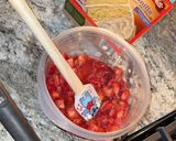 A picture of step 4 of Strawberry jello poke cake.