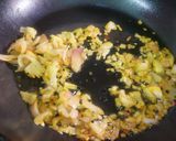 A picture of step 3 of Poha with Potatoes Peas and Pomegranate.