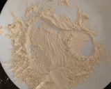 A picture of step 1 of Chicken breasts in breadcrumbs.