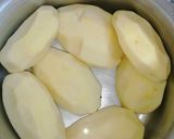 A picture of step 1 of Baked potato wedges.