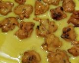 A picture of step 9 of Pakora curry.