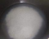 A picture of step 3 of Garlic rice.