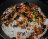 A picture of step 7 of Persian Pomegranate Rice with Pistachio and Raisins.
