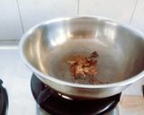 A picture of step 3 of Tasty masaledar Kadhi pakoda with phulka roti for Gujarati dinner.