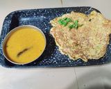 A picture of step 4 of Moong dal chilla.
