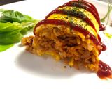 A picture of step 9 of Japanese Egg Wrapped Tomato Chicken Rice (Omu Rice).