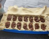 A picture of step 5 of Banana and Nutella Tear and Share Puff Pastries.
