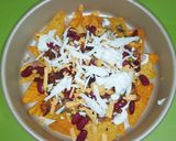 A picture of step 6 of Loaded Cheesy nachos.