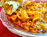 A picture of step 10 of Rajathani papad ki sabji (onion, tomato curry).
