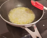Foto del paso 3 de la receta: Conejo en salsa de tomate con hierbas aromáticas