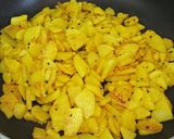 A picture of step 7 of Batatyaachya kaachryaa (stir fry potato vegetable).