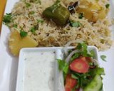 A picture of step 7 of Aloo and Matar pulao.