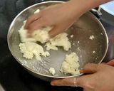 A picture of step 2 of Chhena Poda.