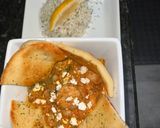 A picture of step 8 of Greek Shrimp in a Spicy tomato sauce.