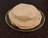 A picture of step 15 of Hazelnut Layer Cake with Hazelnut Cream Frosting.