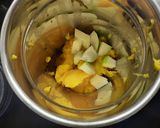 A picture of step 1 of Raw mango and ripe mango ice cream (with milkmaid and fresh cream).