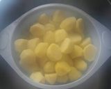 A picture of step 4 of Spicy roast potatoes.