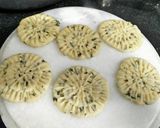 A picture of step 10 of Kasoori methi flavoured phool mathris.