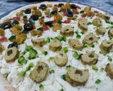 A picture of step 4 of Tikka n kabab pizza.