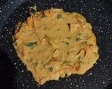 A picture of step 3 of Sattu and Mix veg cheela.