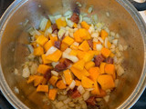 Judías blancas con costillas, calabaza y kale