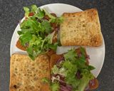 A picture of step 5 of Crispy Chicken Sandwich with Pickled Red Onion and Sriracha Mayo.